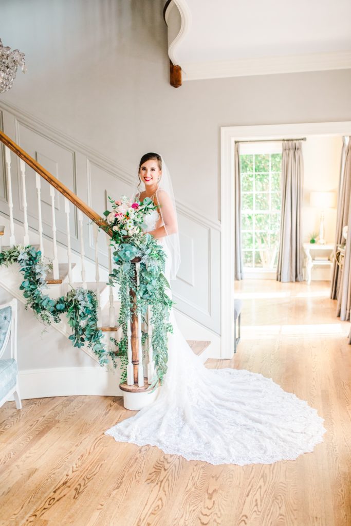 Classic, light and airy bridal portrait session at the bottom of the staircase at the Highgrove Estate outside of Raleigh, NC. Photography by Tierney Riggs Photography
