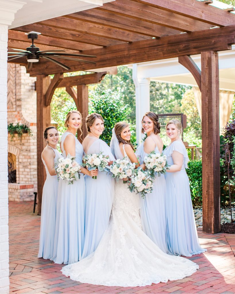 Light blue bridesmaids inspiration| Devan and her bridesmaids were stunning in their dresses at the Highgrove Estate in Raleigh, NC| Photographer Tierney Riggs