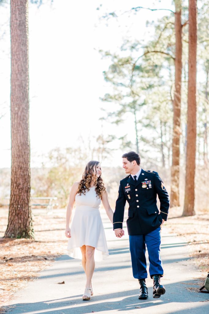A couple walking at their Raleigh, NC engagement session by Tierney Riggs Photography