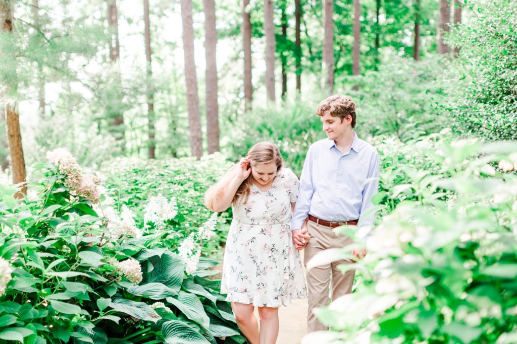 Walking through the garden during their engagement session
