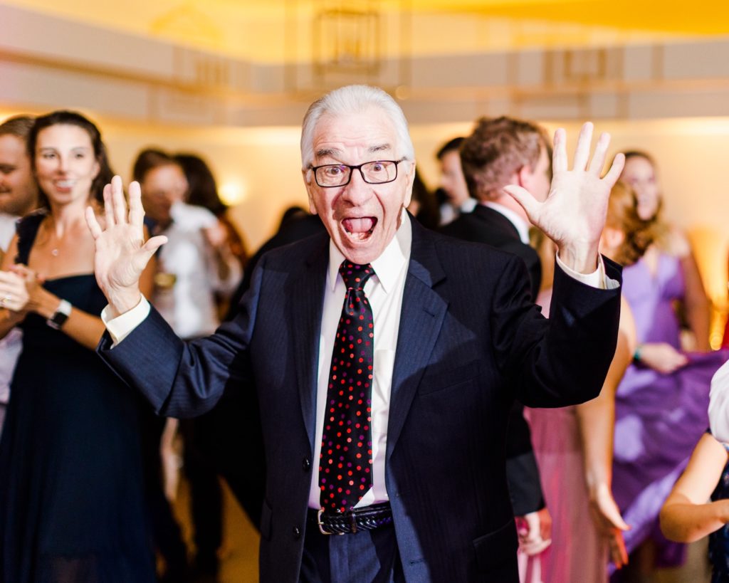 Grandpa enjoying himself at a 1705 east wedding reception