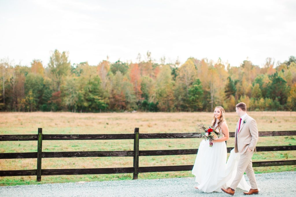 Couple walking during their Oakland Farm, Raleigh NC wedding day