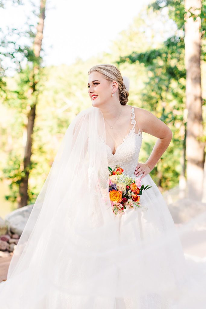 A bride laughing at her bridal portrait session in South Carolina captured by Tierney Riggs Photography