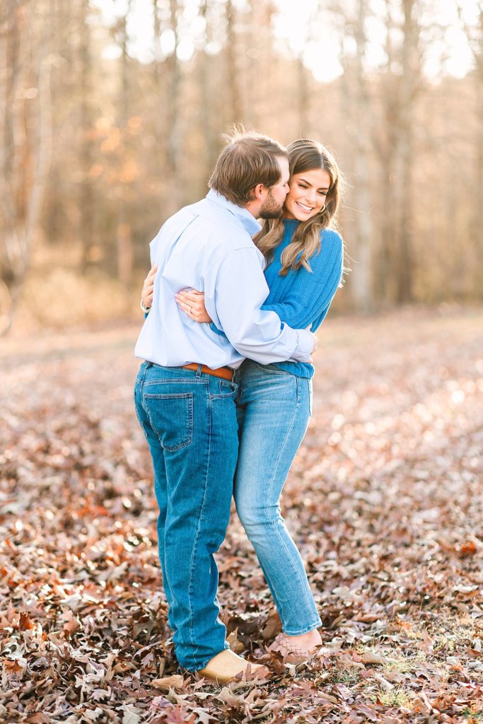 Couple laughing together at their engagement session in Erwin, NC