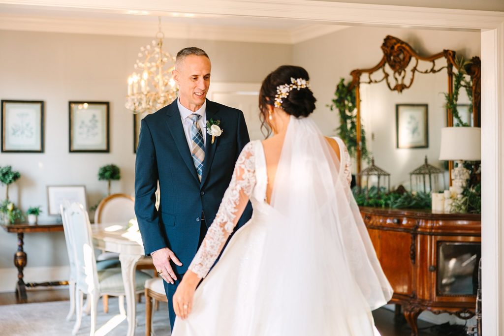 A dad seeing his daughter for the first time on the wedding day at the Highgrove Estate