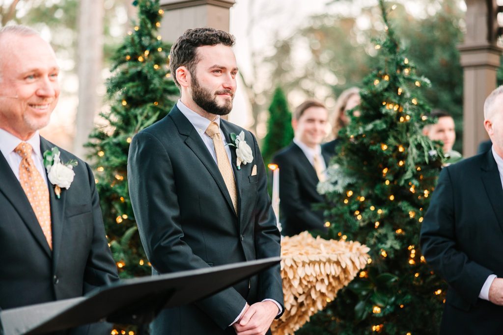 A groom seeing his bride at their Highgrove Estate wedding ceremony