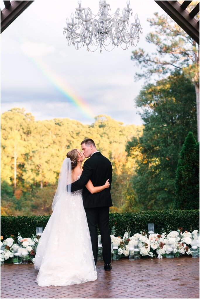 Bride and groom with a rainbow at the Highgrove Estate| Raleigh, NC Wedding Photographer Tierney Riggs Photography