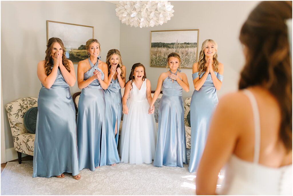 First look with bridesmaids at Highgrove Estate in Fuquay Varina