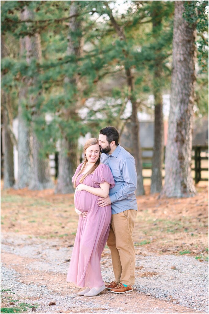 A couple celebrating the arrival of their baby soon through maternity photos in Holly Springs, NC.