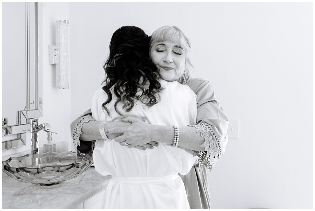 Mom hugging her daughter on her wedding day in Cary, NC