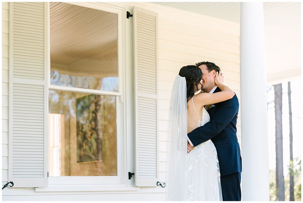 First look between a happy couple on their wedding day at the Upchurch wedding venue in Cary, NC