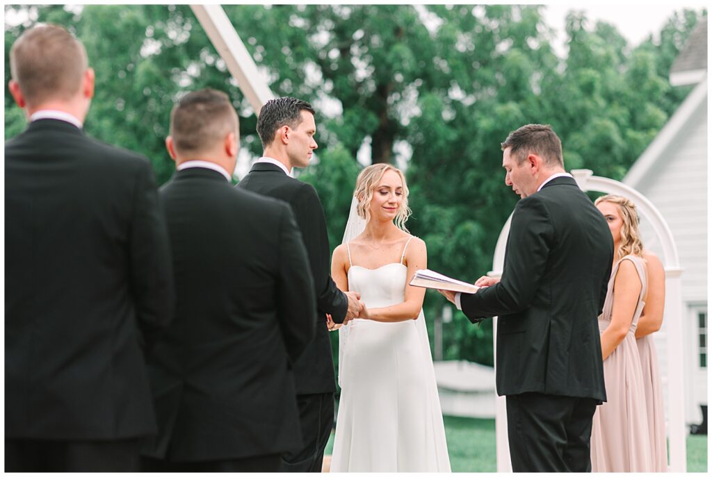 A wedding ceremony taking place at Walnut Hill wedding venue in Raleigh, NC