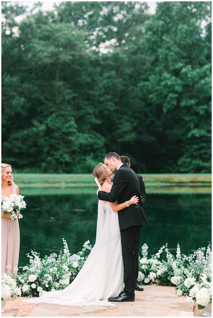 Couple kissing at their wedding ceremony