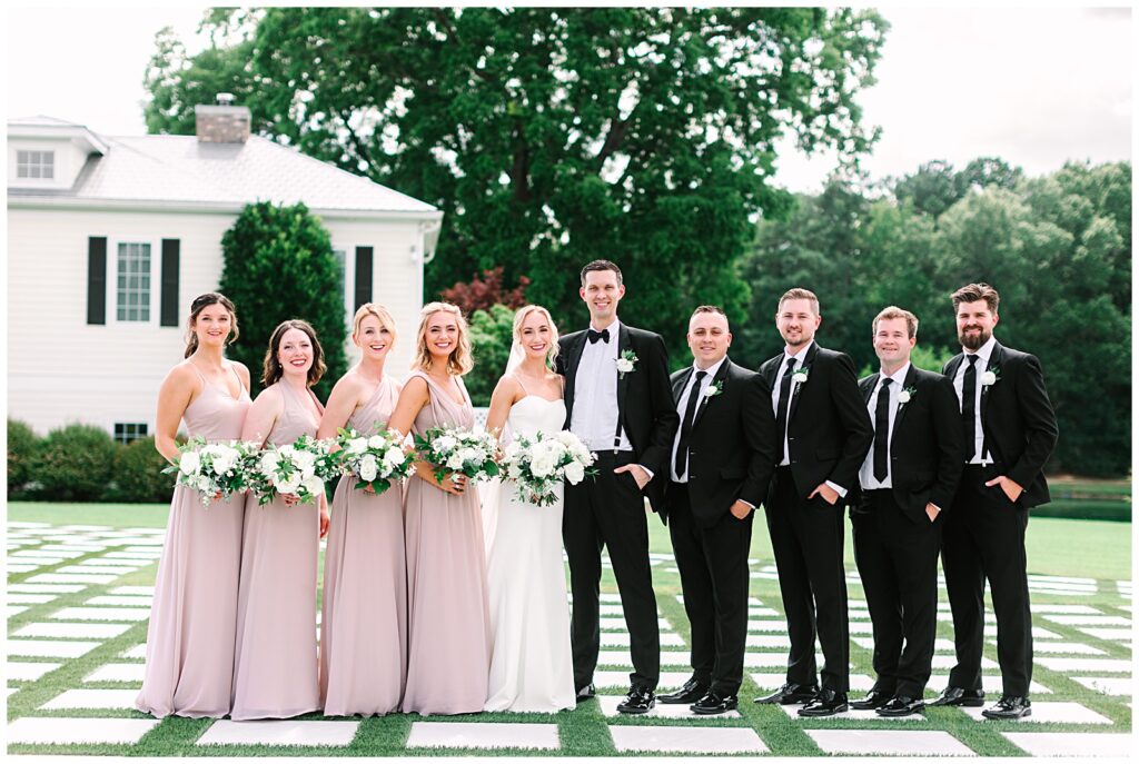 Wedding party posing for photos at Walnut Hill