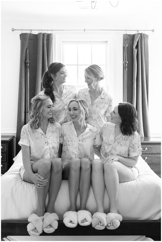 Bride and her bridesmaids in the bridal suite at Walnut Hill in Raleigh